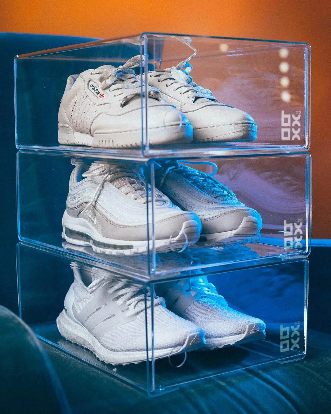 Stacked shoe boxes by window