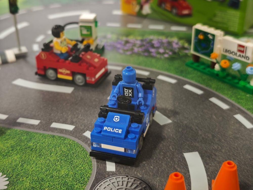 In-house designed and printed base with BOXXCO Minifigure!
